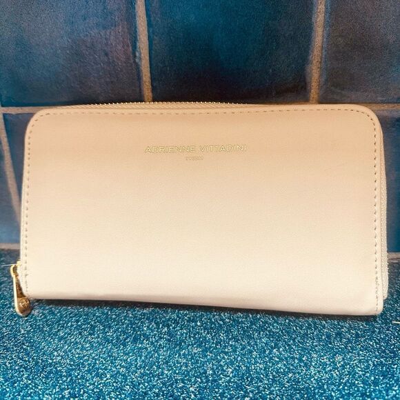 Adrienne Vittadini cream colored, double zip around wallet. - Picture 1 of 6